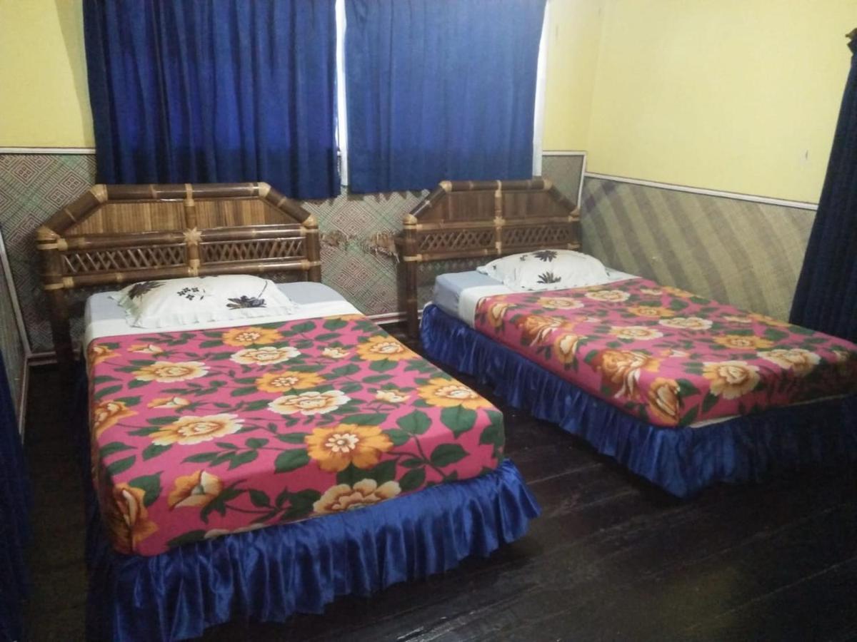 Roman Sinasi Hotel Tongging Exterior foto